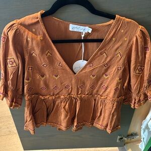 Women’s petal & pup top size 4